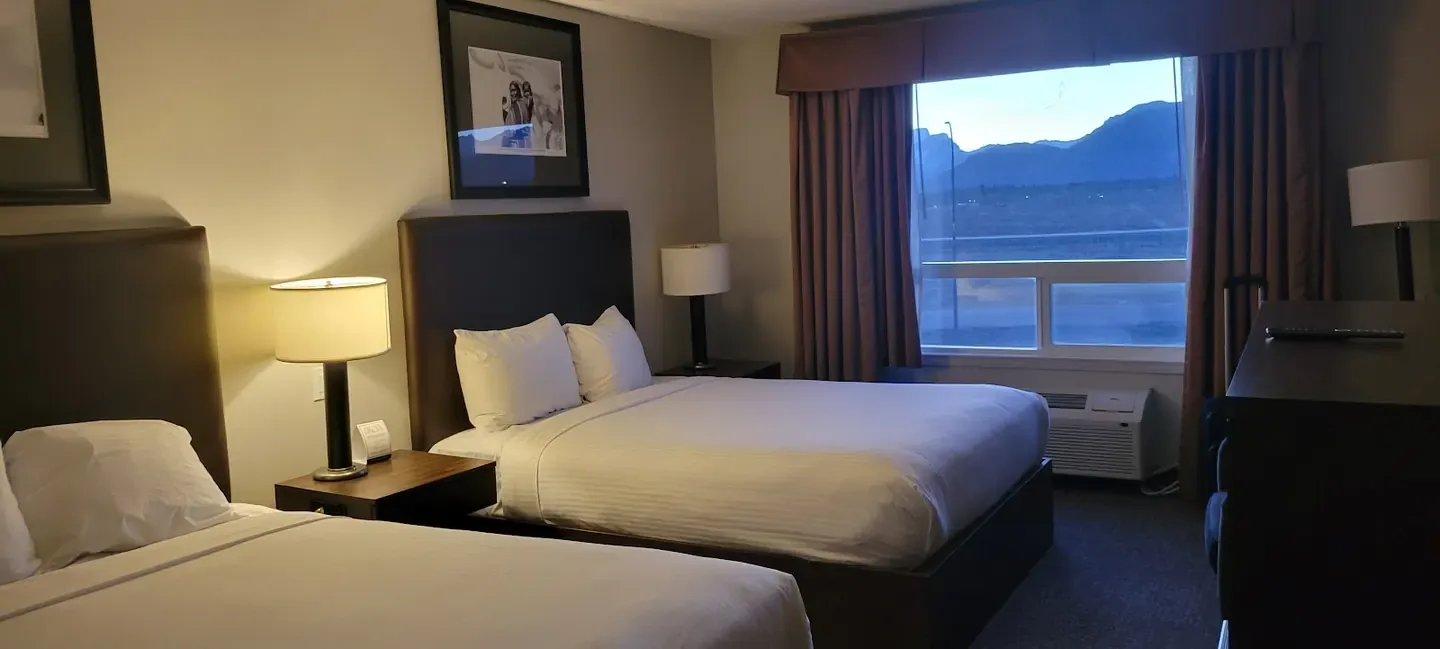 Resort grounds against open Alberta landscape